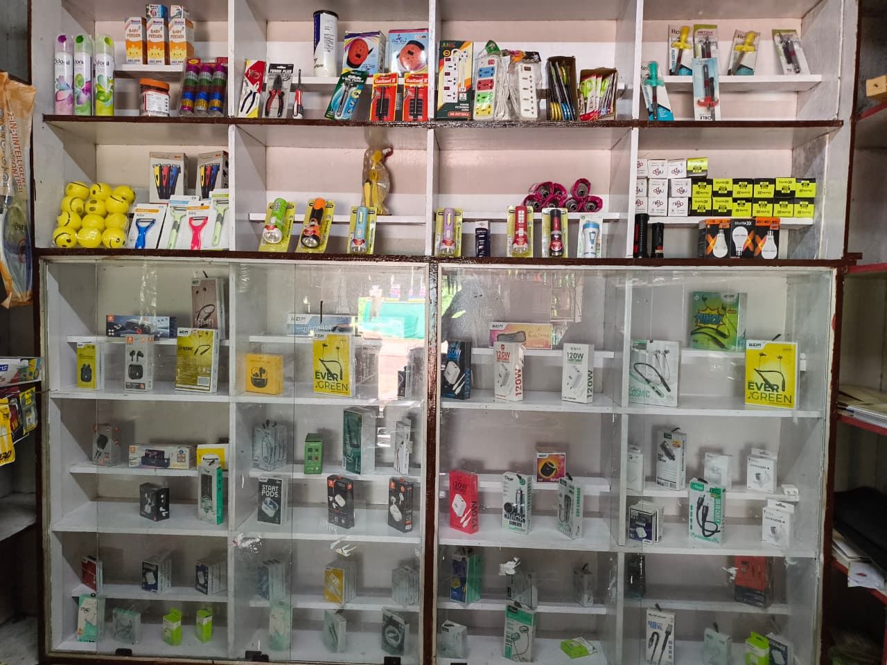 Shelves of stationery and small hardware items